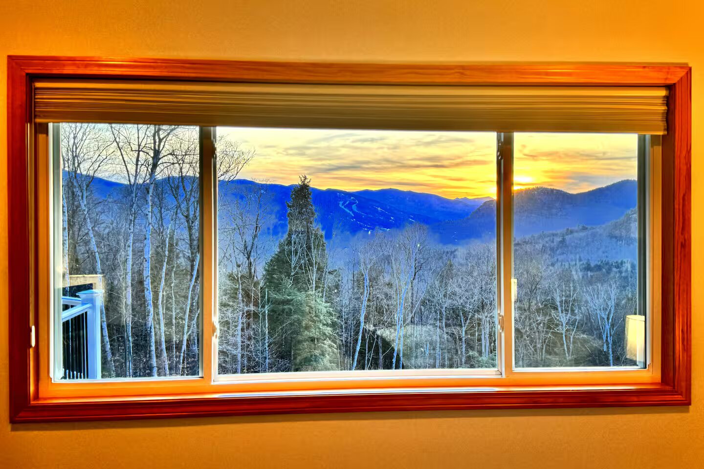 Winter sunset through window